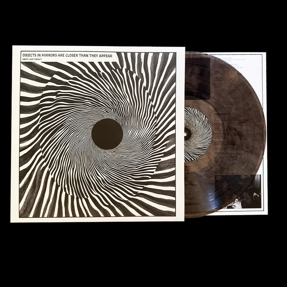 "OBJECTS IN MIRRORS ARE CLOSER THAN THEY APPEAR" VINYL product image